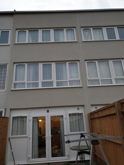 3 double bedroom townhouse with balcony, garage, small garden.  Lots of storage space.   photo